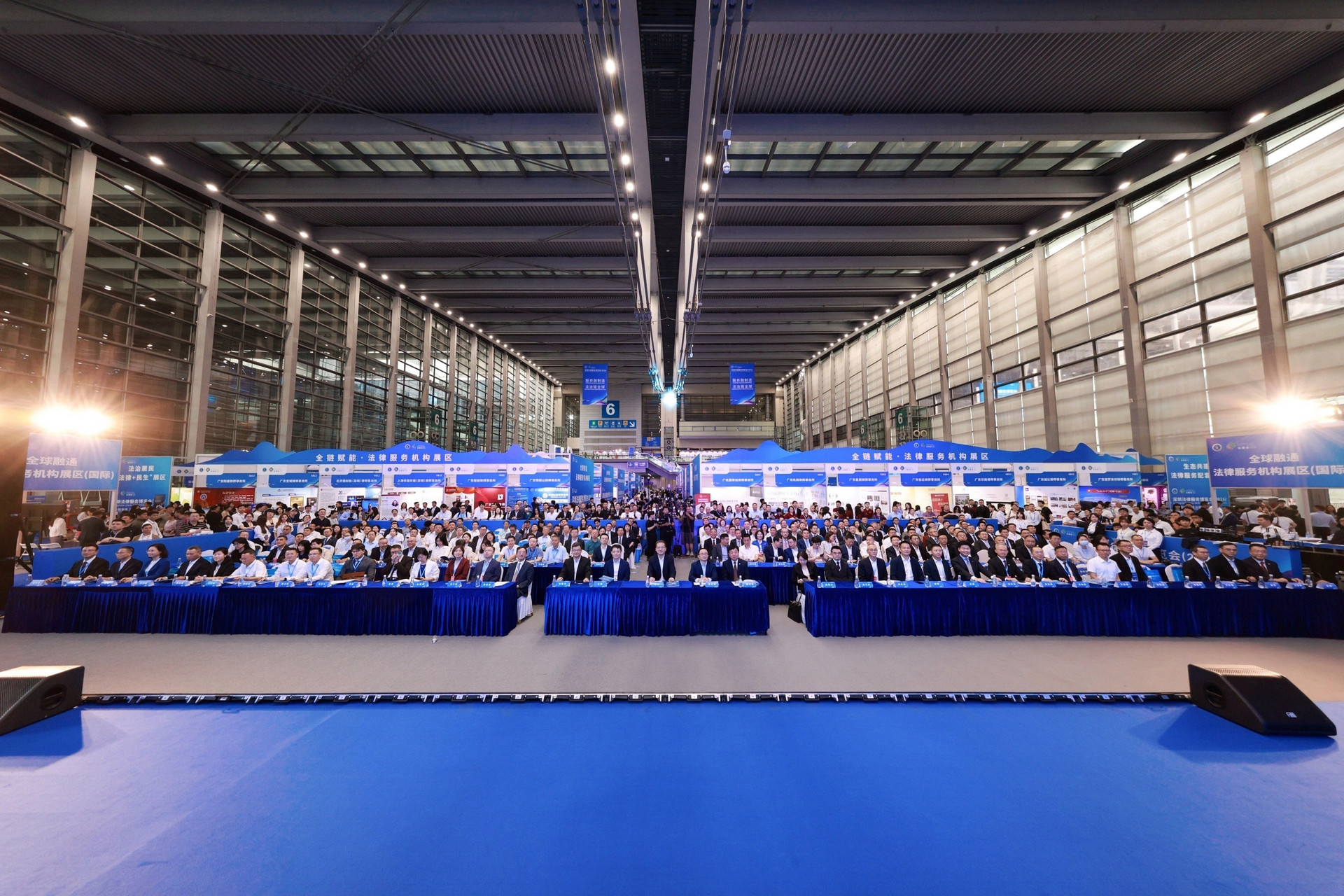 Business and legal practitioners take part in an event at the exposition