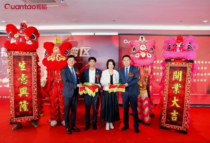 Dong Mingzhu, Chairwoman of Gree Electric Appliances, Inc. of Zhuhai, joins the lion dance eye-dotting ceremony